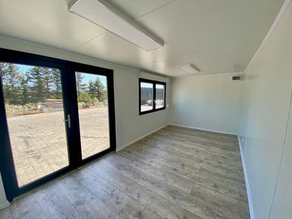 Contenedor de oficina reconvertido de 18 m²